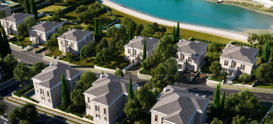 Aerial view of landscaped Rolling Hills Liqeni villas beside Farka Lake — investments